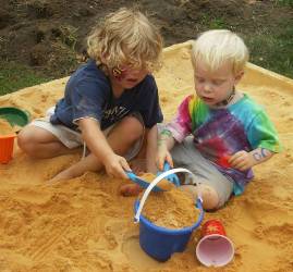 toddlers in sandpit
